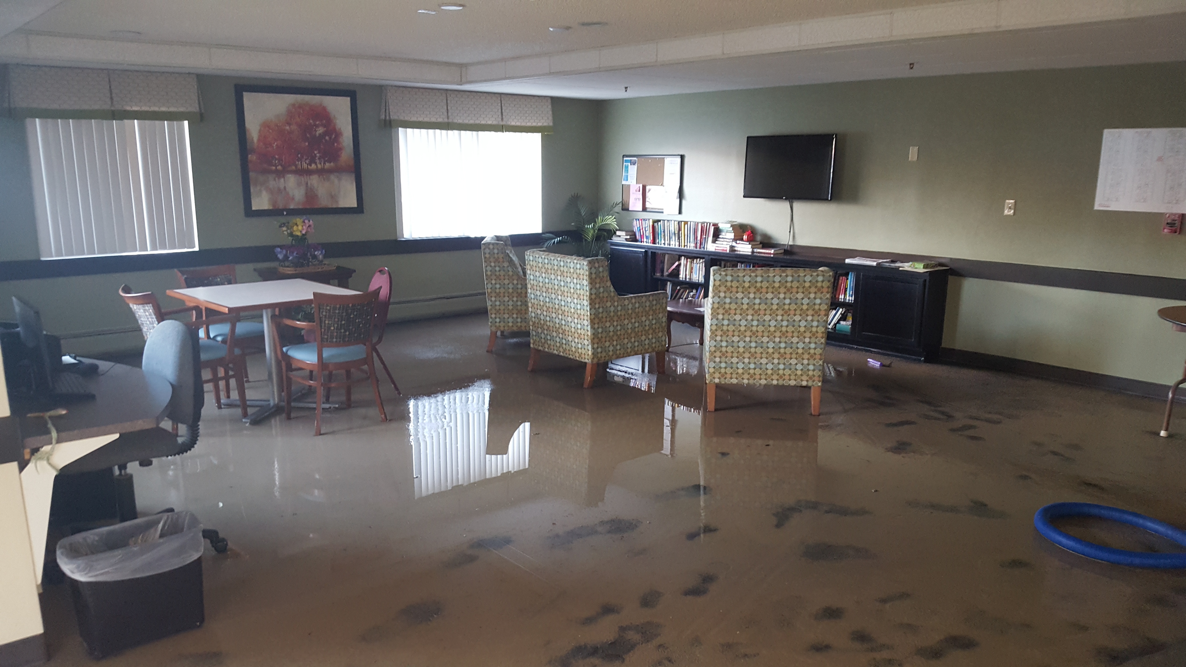 Water damage requiring professional flood cleanup