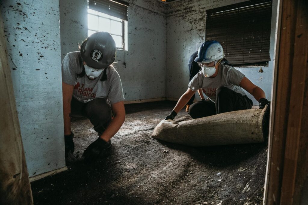 Restoration professionals on site after flooding