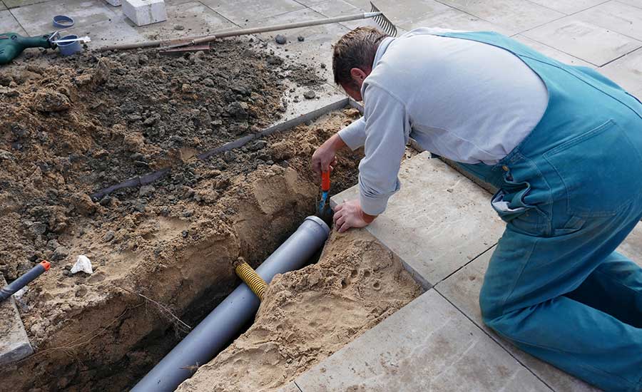 Certified technicians performing sewage cleanup